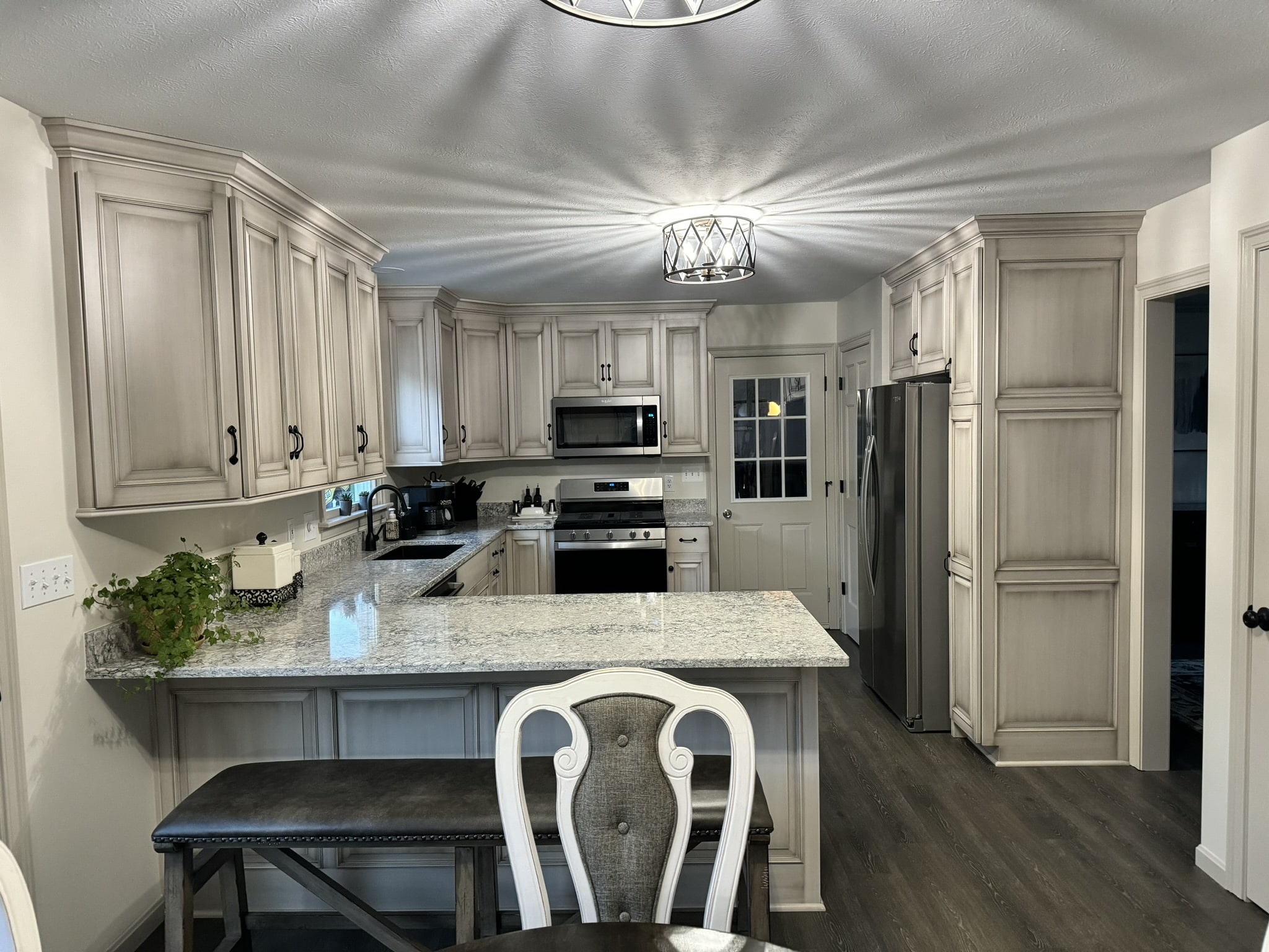 Renovated kitchen cabinets - grey wash