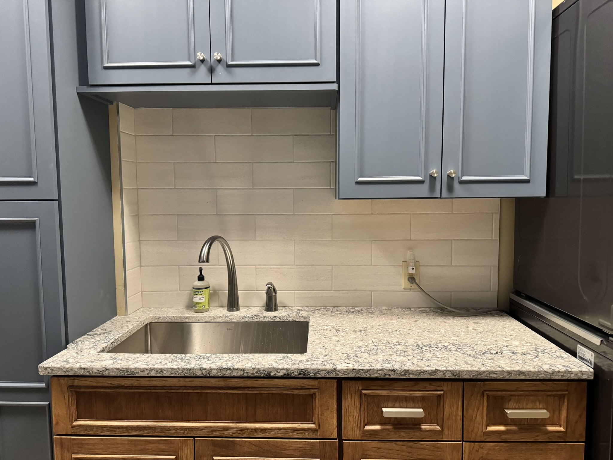 Blue cabinets in mudroom