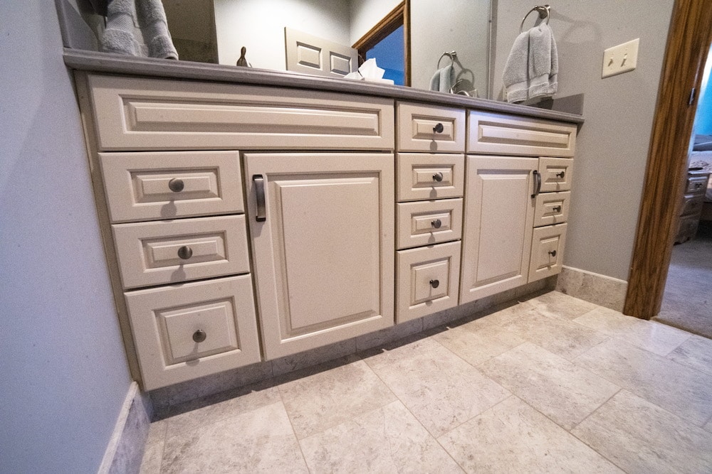 Cream colored bathroom cabinets