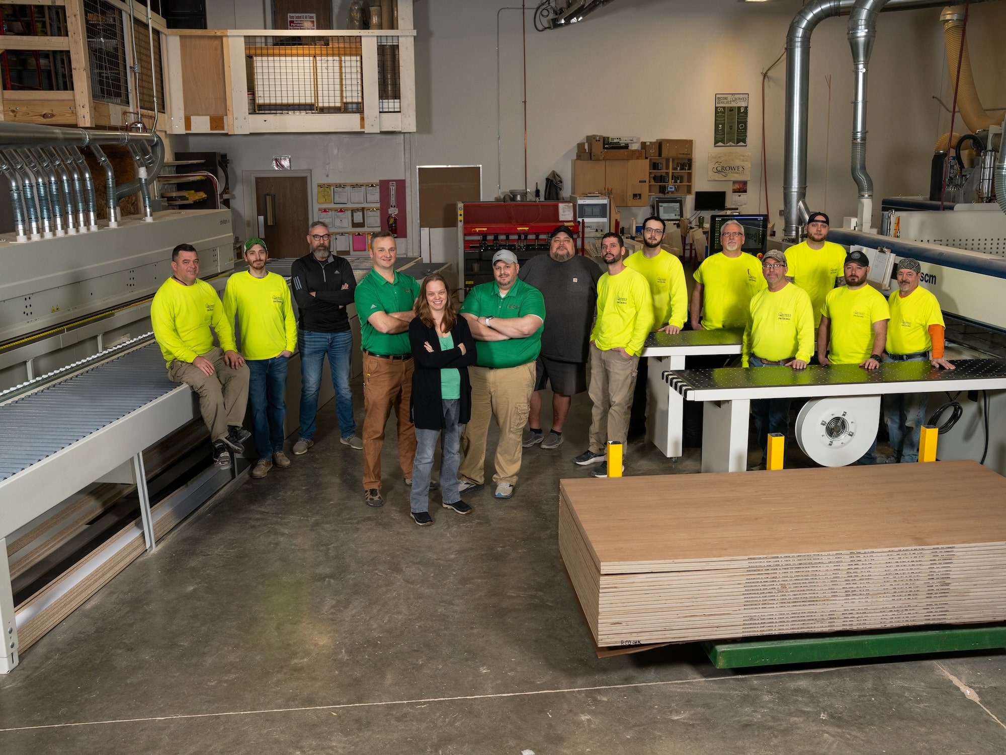 Crowe's Cabinets team in warehouse